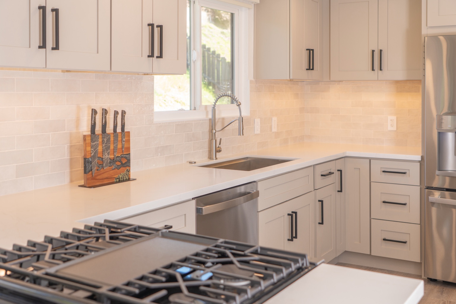 A clean, modern kitchen, completed project